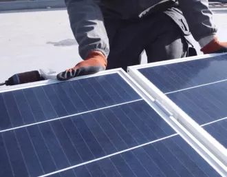 solar installer by solar panel