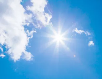 sun rays in a blue sky