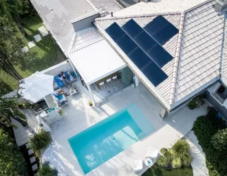 view of solar panels on rooftop of home