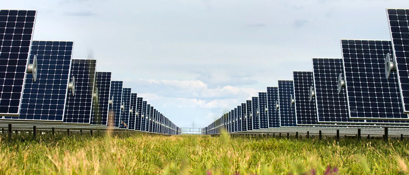SunPower solar panels in field of grass SunPower solar panels in field of grass