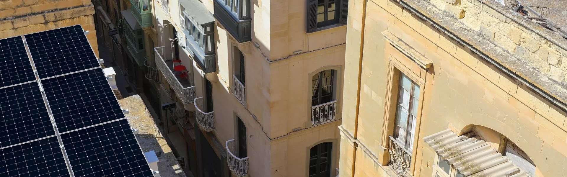Shifting from fossil fuels to a net-zero future with Maxeon SunPower solar technology, installed on a rooftop in the city centre of Malta.