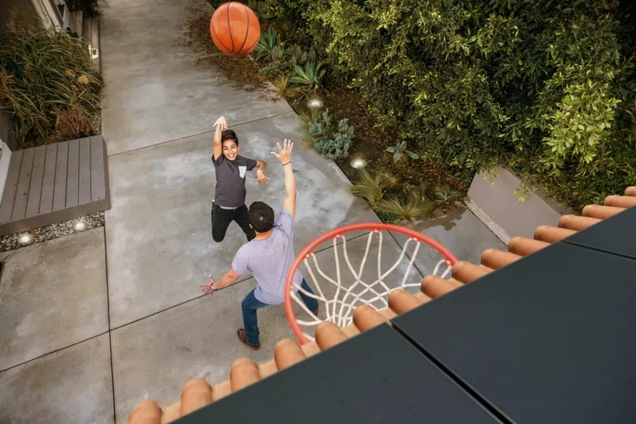 Durable Solar Technology Next to the Basketball Hoop Durable Solar Technology Next to the Basketball Hoop